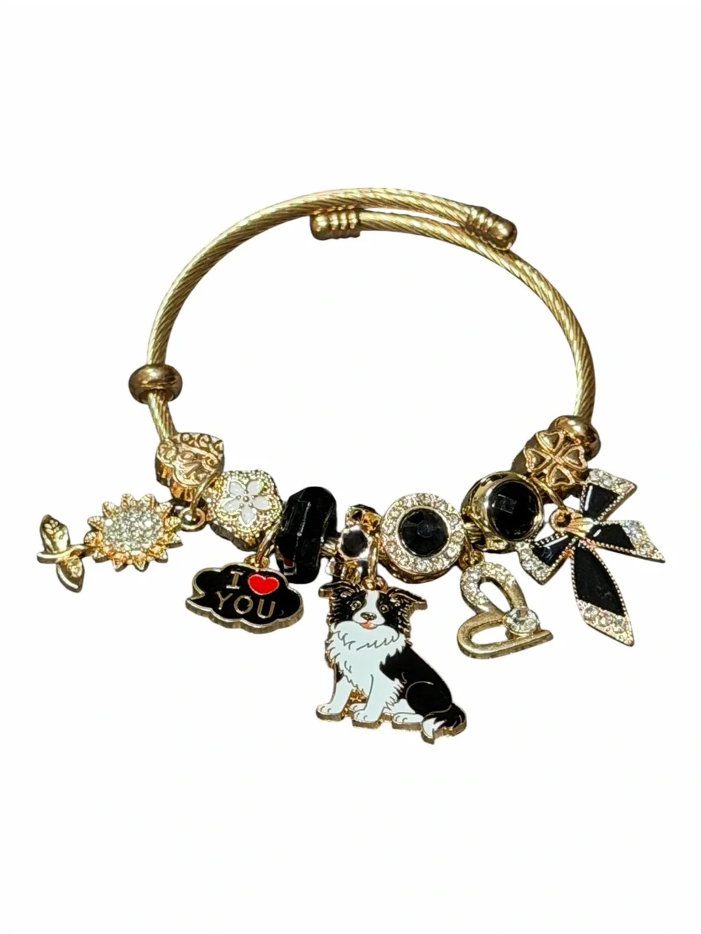 Gold Tone Charm Adjustable Twisted Bangle W/Black & White Dog and Heart Charms